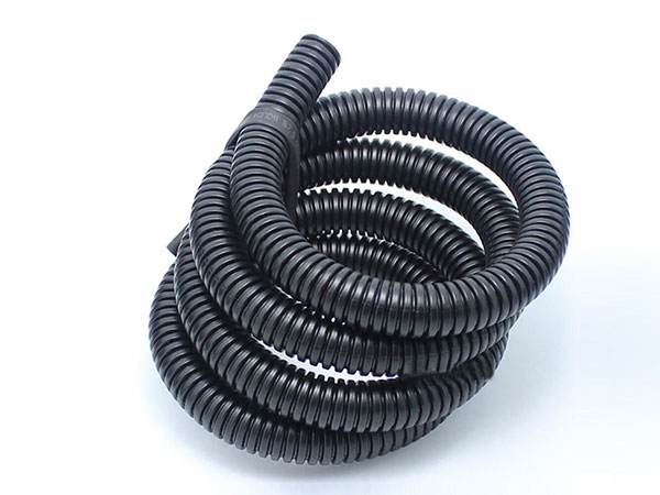 https://www.wireproauto.com/wp-content/uploads/2023/09/Corrugated-Plastic-Pipes-cutting.jpg